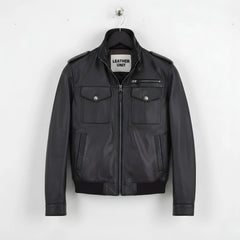 front view of men's black leather field jacket with epaulettes and flap pockets.