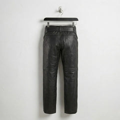 Back view of men's black leather chaps showing straight-leg design