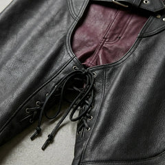 Close-up of lace-up front panel on men's black leather motorcycle chaps