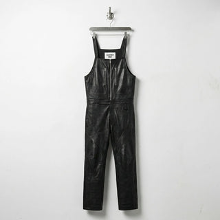 Front view of men's black leather overalls with zip chest pockets by Leather Unit