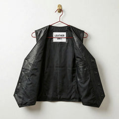 Interior of men's black leather vest with full black lining and inside pocket