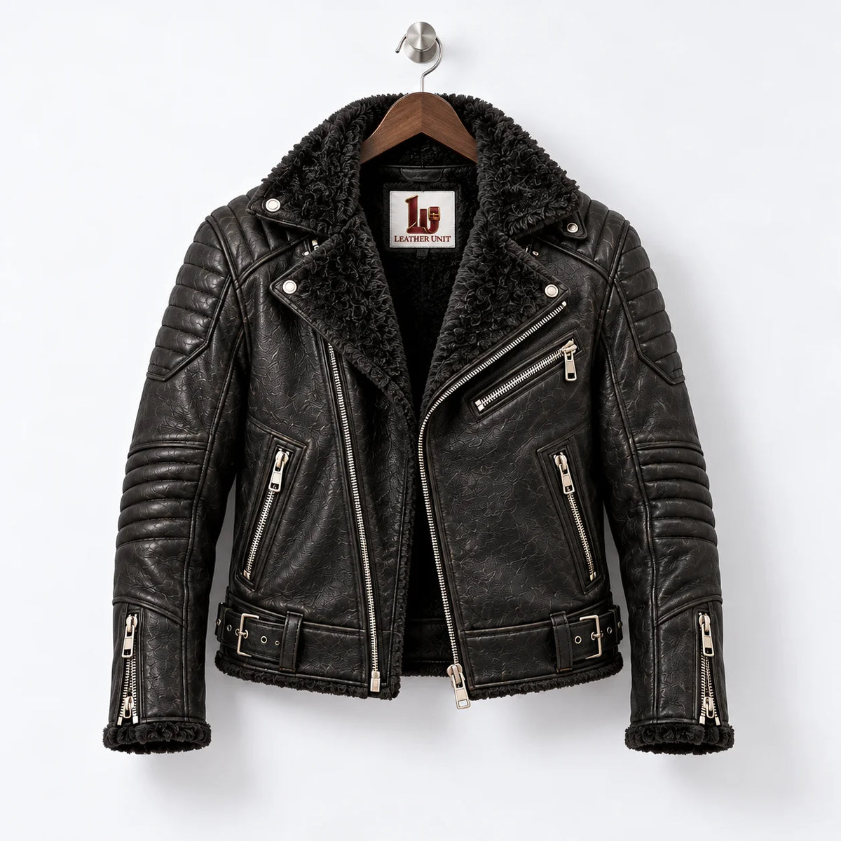 Front hanger view of black sheepskin biker jacket with faux fur collar, asymmetric zip and three zip pockets