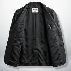 Inside lining of men’s black leather blazer showing interior pockets