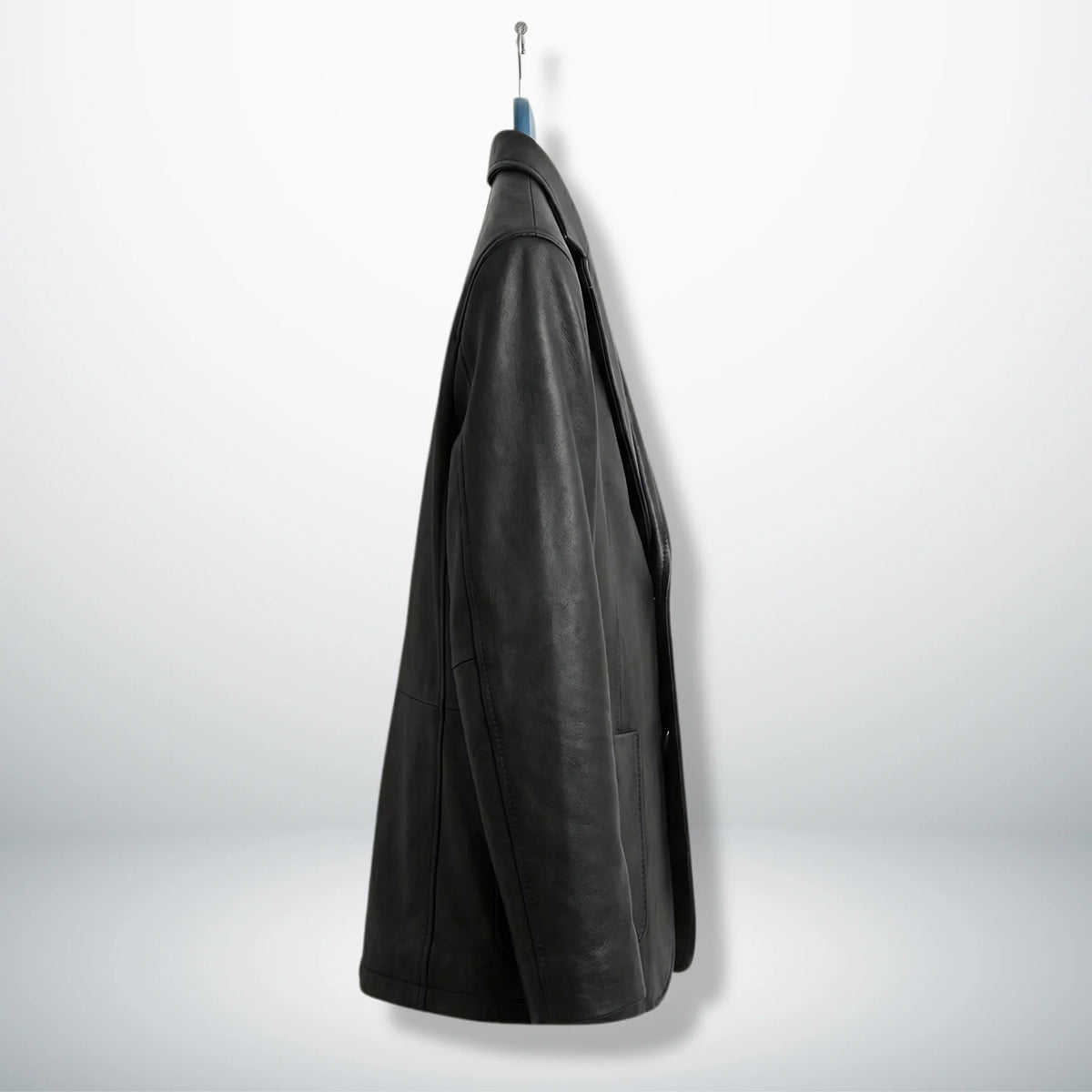 Side profile of men’s black notch lapel leather blazer