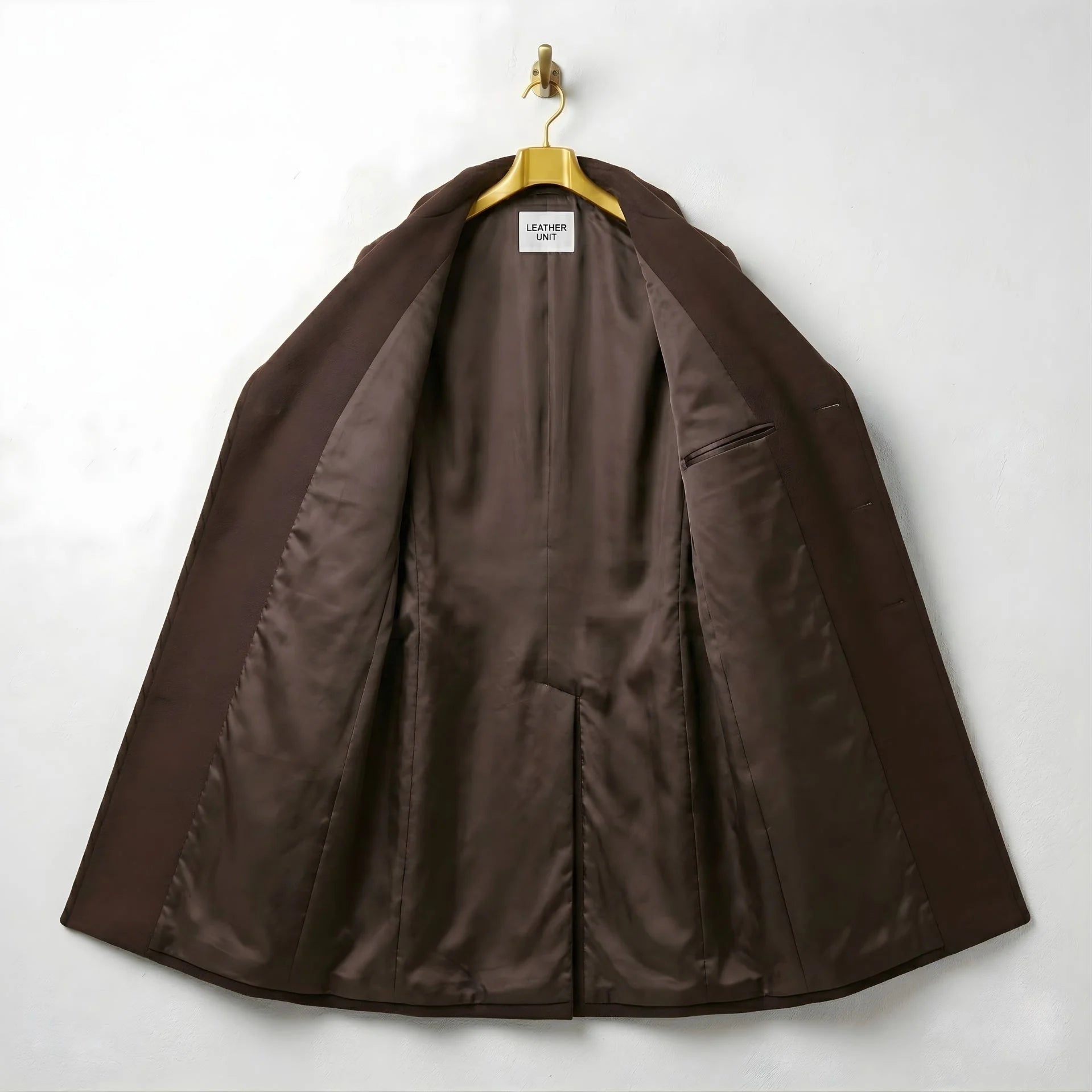 Interior of men's brown wool overcoat showing smooth brown lining.