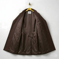 Interior of men's brown wool overcoat showing smooth brown lining.