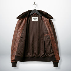 interior view mens brown aviator leather jacket with brown lining and zip pocket.