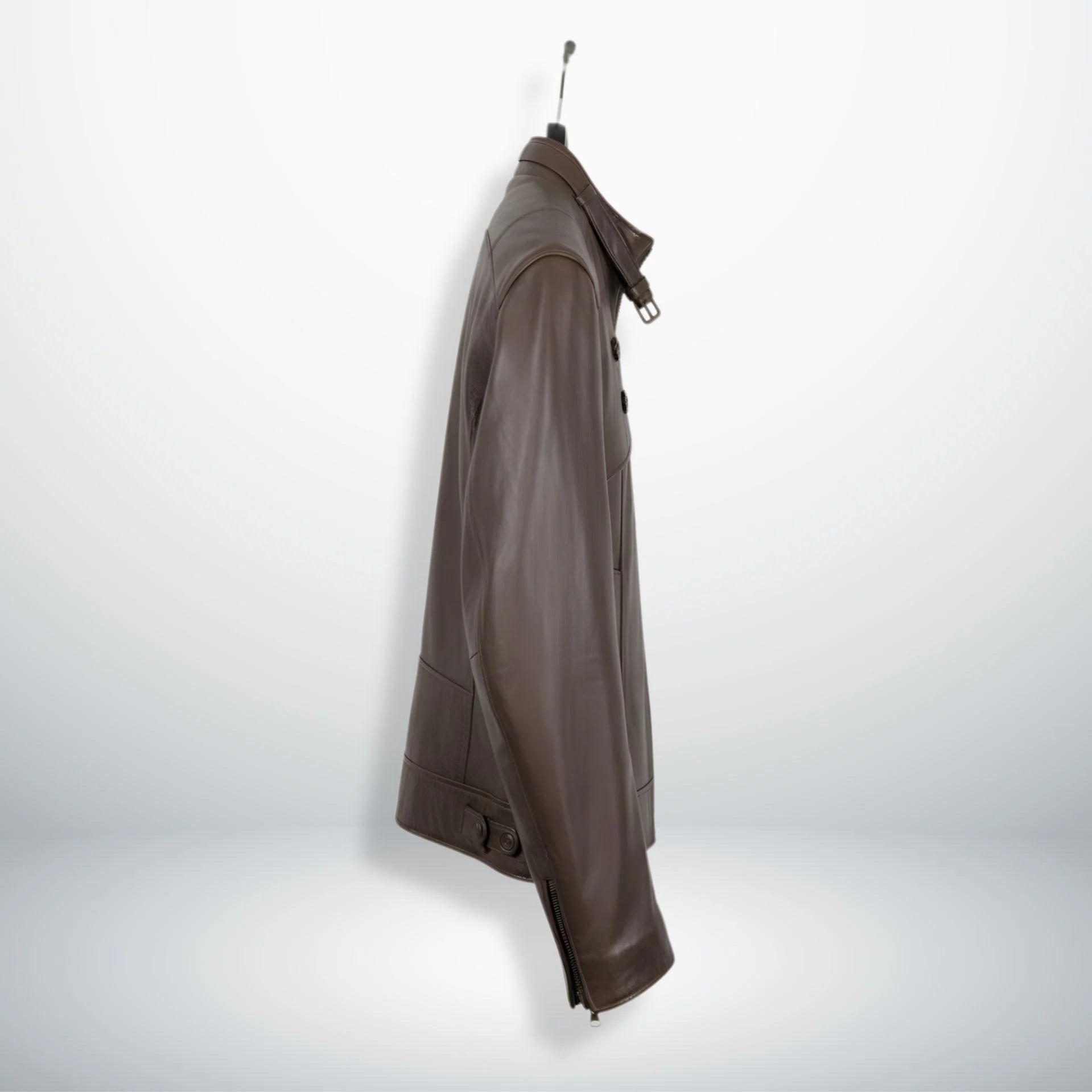 side profile of men's brown leather moto jacket with collar buckle.