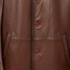 Button front and welt pockets on men’s brown leather blazer jacket