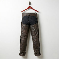 Back view of men's brown leather chaps showing open seat and lace-up waist