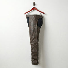Opposite side view of distressed brown motorcycle chaps with snaps