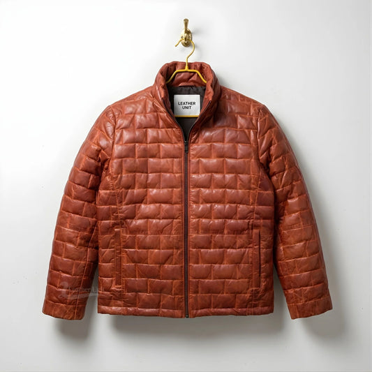 Front view of men's brown leather puffer jacket with quilted squares and stand collar.