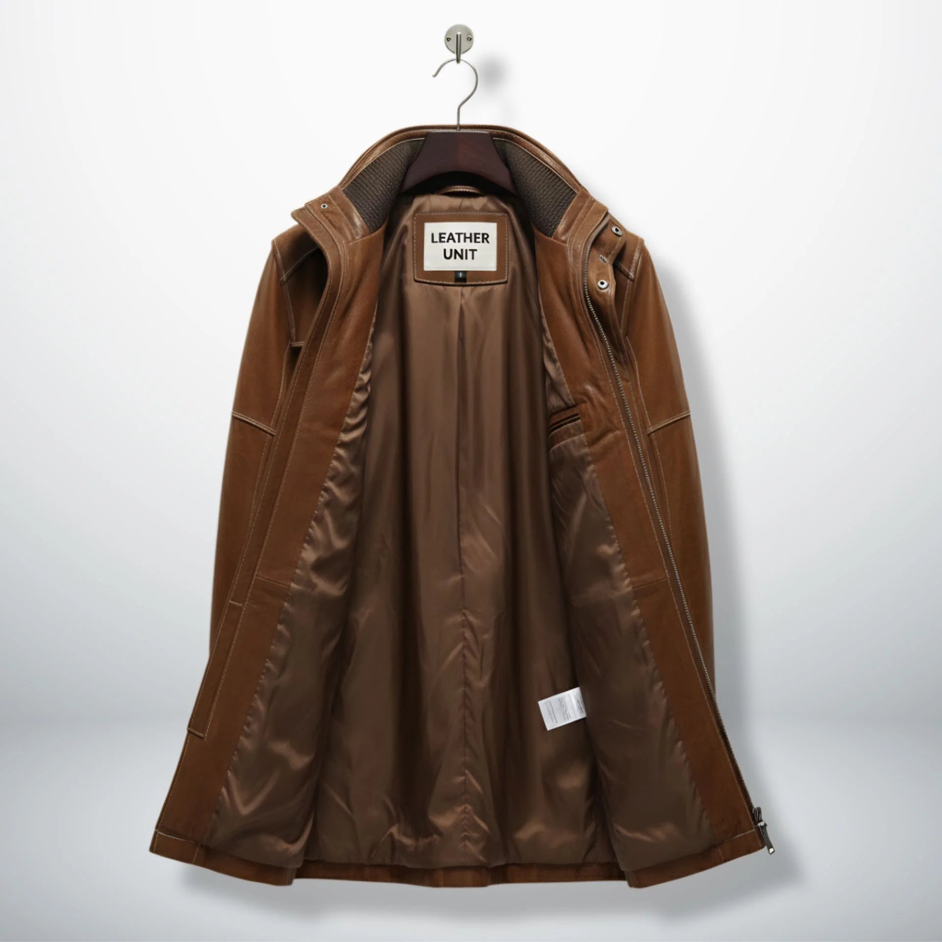 Inside lining of men’s brown leather winter coat showing interior pockets