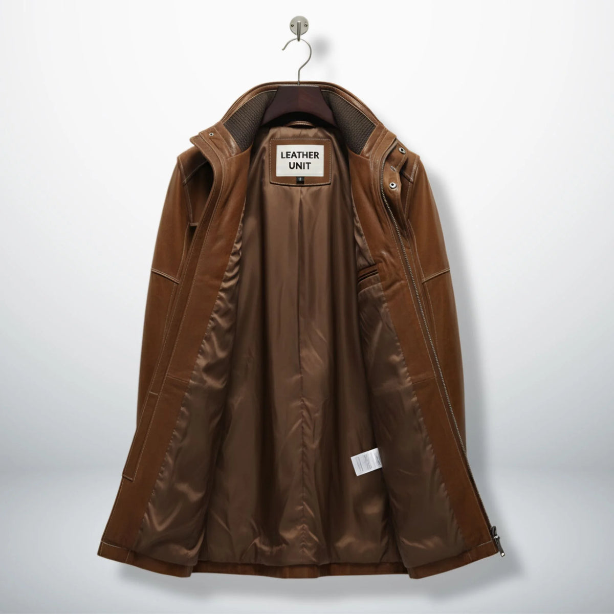 Inside lining of men’s brown leather winter coat showing interior pockets