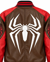 Close-up of large white spider graphic across brown leather back with red shoulder panels and black red ribbed collar