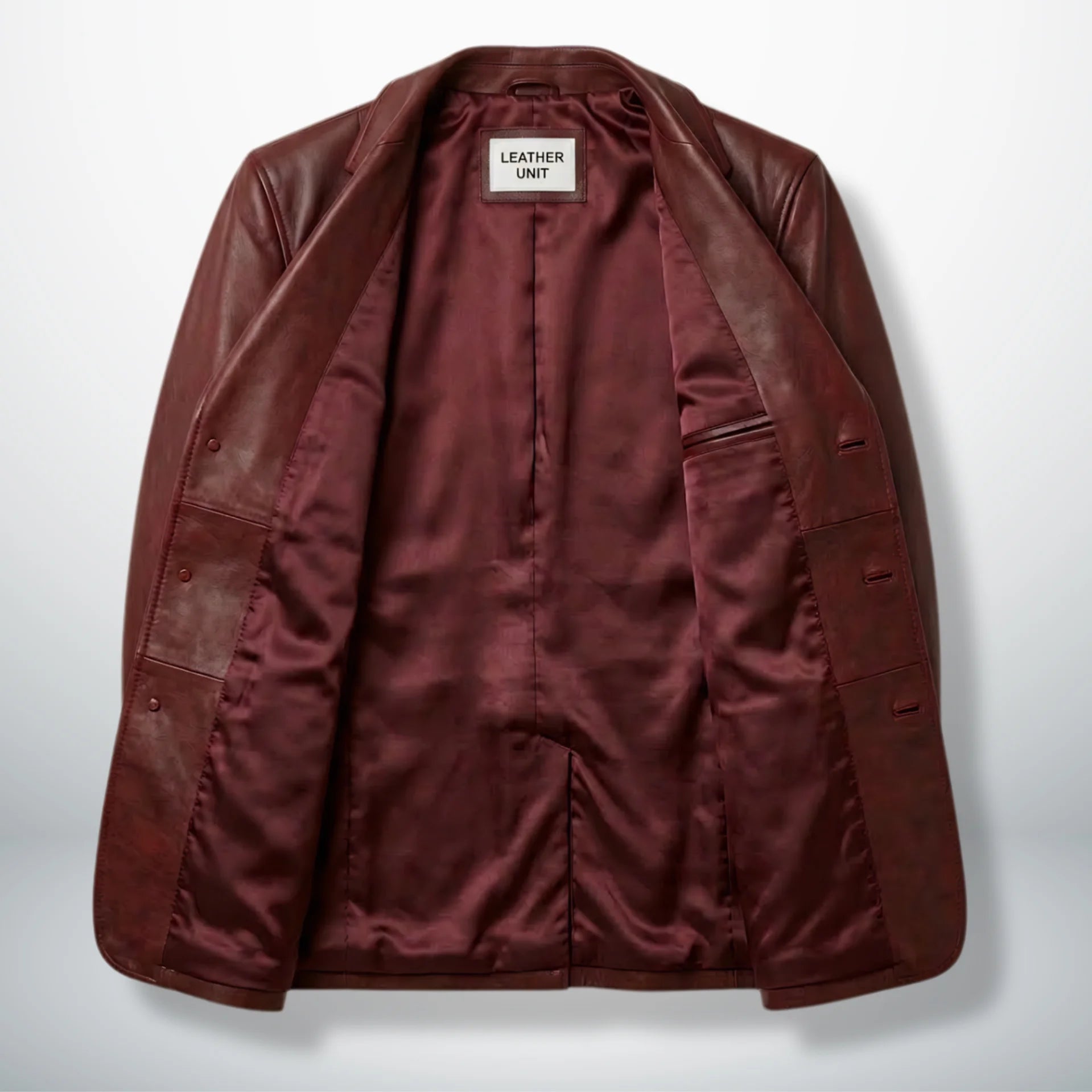 Inside lining of men’s burgundy leather blazer jacket showing interior pocket