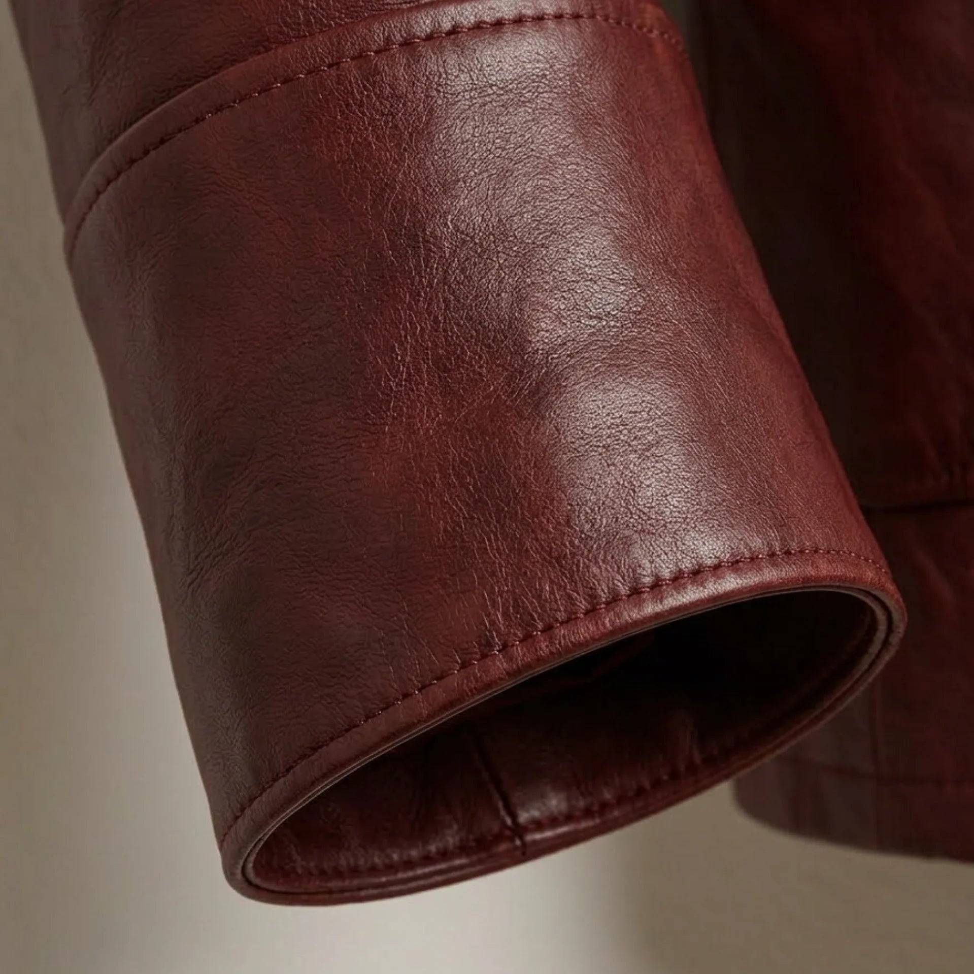 Sleeve cuff detail on men’s burgundy genuine leather blazer
