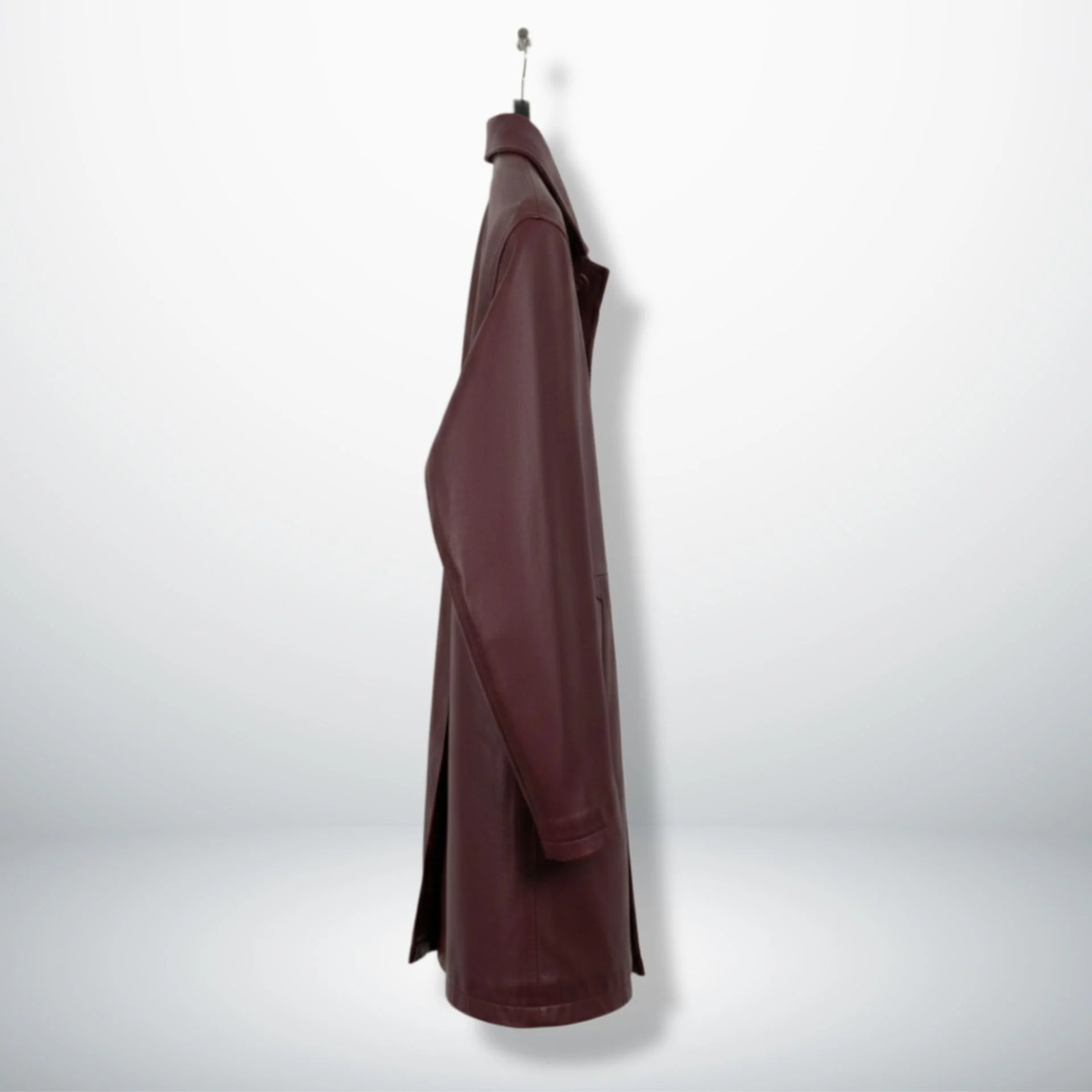 Side profile of men’s burgundy lambskin leather car coat