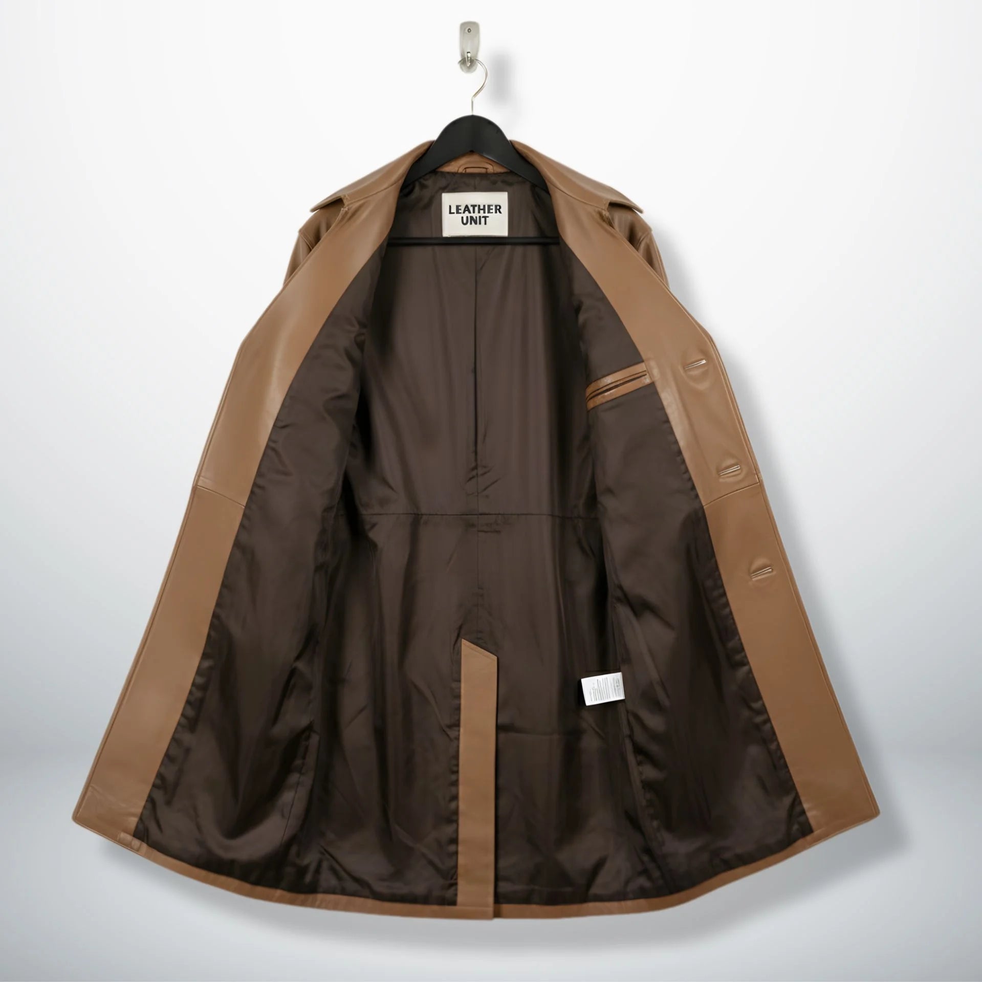 Interior of men's camel brown leather coat showing dark brown lining.