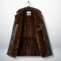 Inside of men’s dark brown shearling coat showing full fur lining