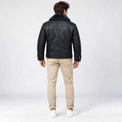 Rear model view of midnight navy leather aviator jacket showing shoulder yoke, centre seam and waist tabs