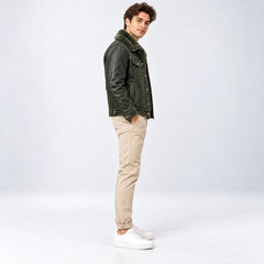 Side profile of men’s olive green trucker jacket showing shirt-style fur collar and vertical hand pocket