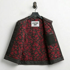Interior of men's leather biker vest showing red paisley lining and inside pocket
