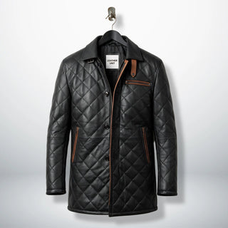 Front view of men’s black quilted leather car coat with brown trim by Leather Unit
