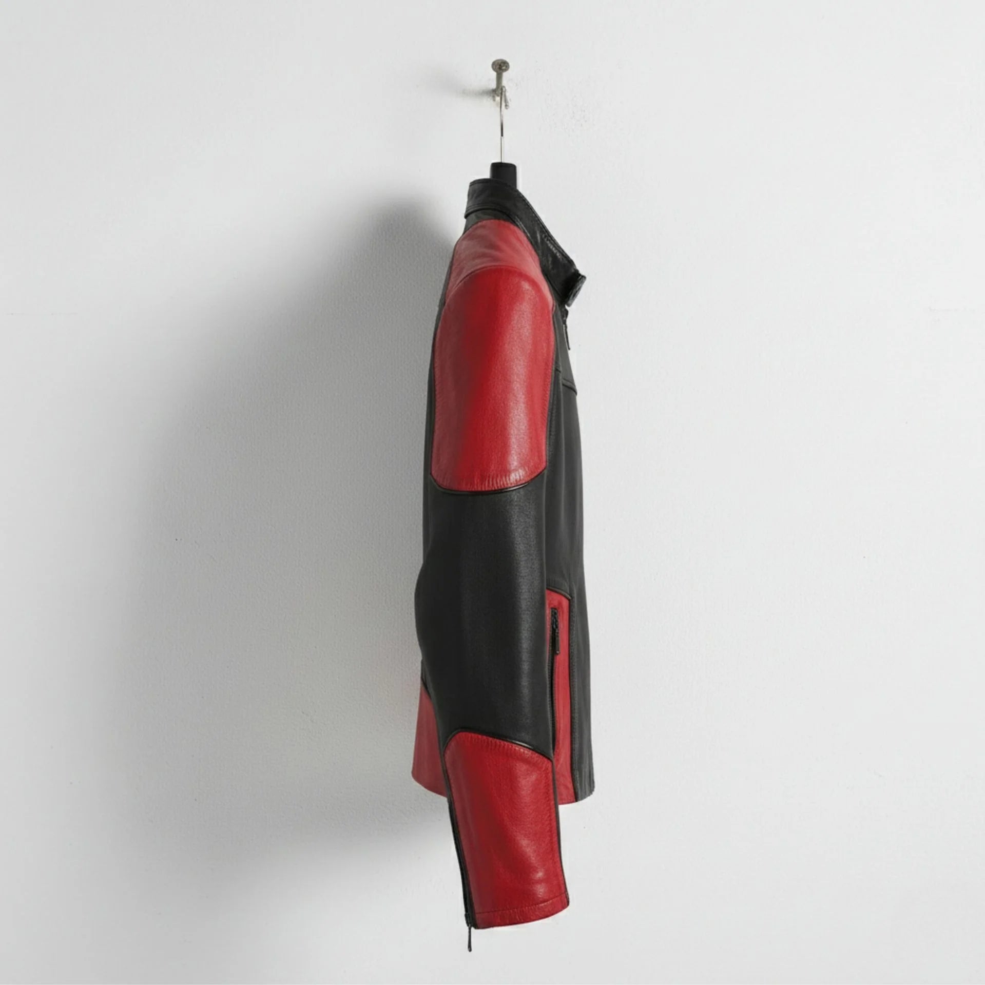 side profile of men's red and black cafe racer leather jacket.
