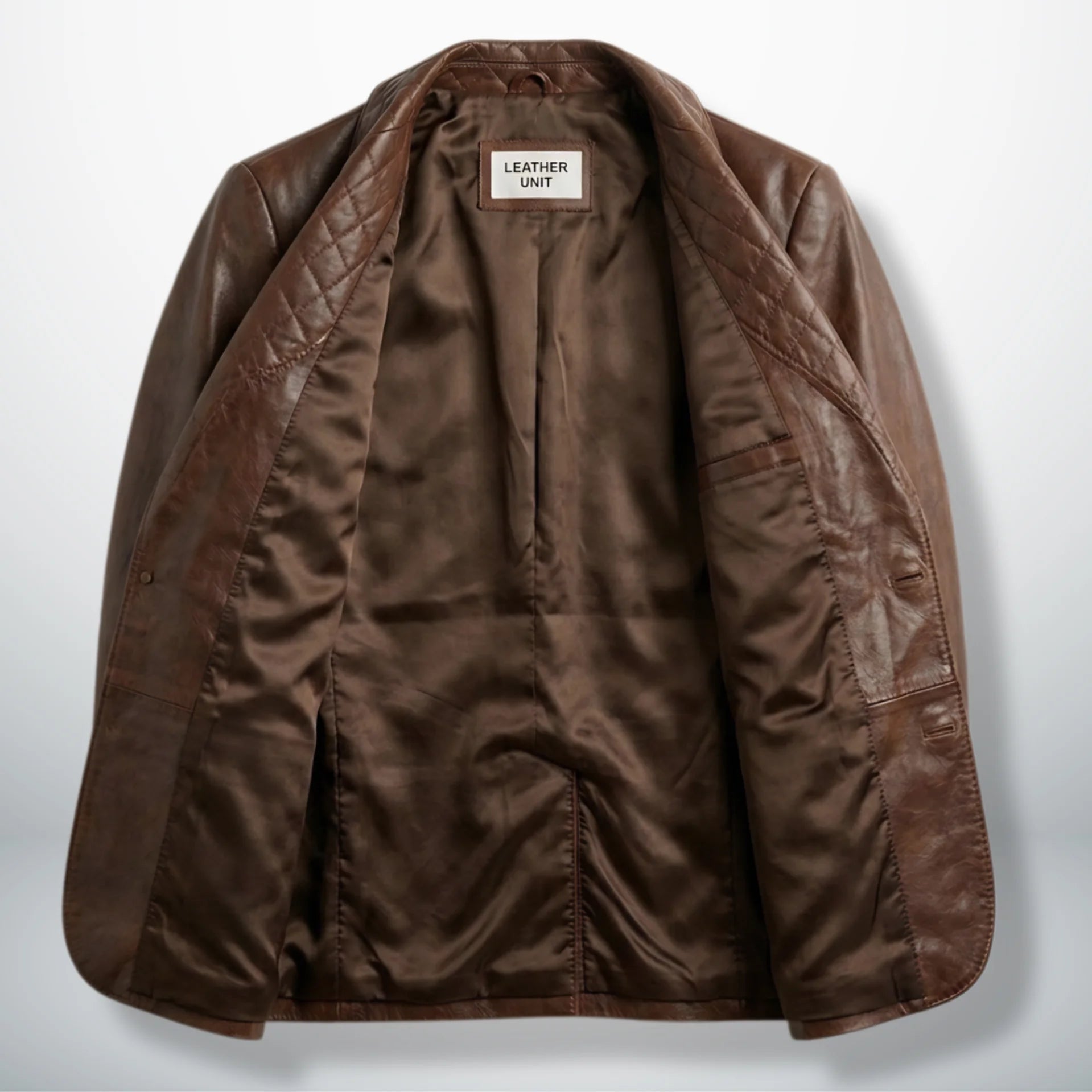Inside lining of men’s Spanish brown leather blazer showing interior pocket