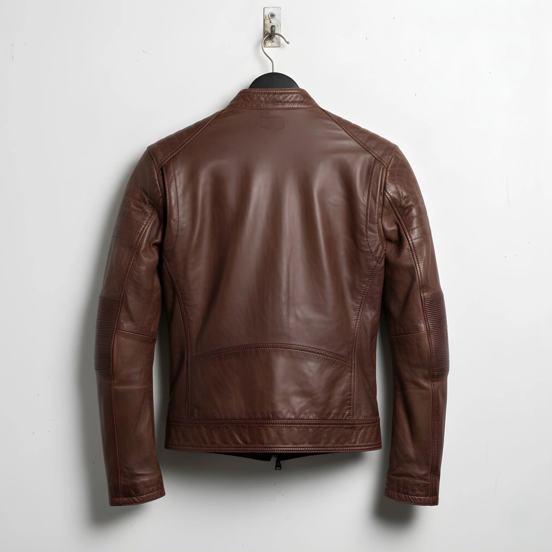 back view of men's brown cafe racer leather jacket with panelled seams.