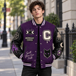 Model wearing purple Midnight Coven Halloween varsity jacket with black leather sleeves and witchcraft patches outdoors