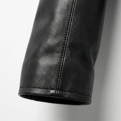 Close up of sleeve and cuff detail on womens black leather jacket