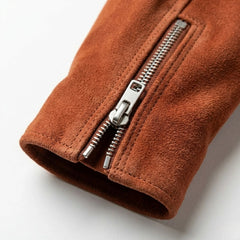 Detail of metal zipper cuff on tan suede leather jacket