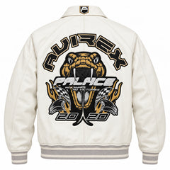White varsity bomber jacket back view featuring large black and gold snake racing graphics and striped ribbed waistband