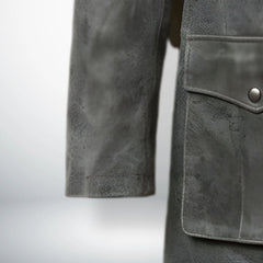 close up sleeve and hem detail on mens vintage grey leather coat.