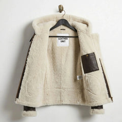 Inside view of women’s B3 aviator jacket showing full cream shearling lining and interior pocket