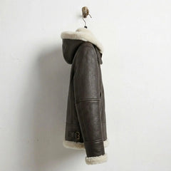 Side profile of women’s brown shearling hooded leather bomber jacket