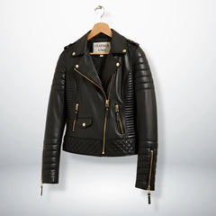 angled front view womens black slim fit moto jacket with gold hardware.