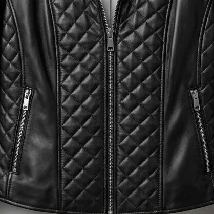 Zipper pocket detail on women’s black quilted leather jacket