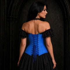 Back view of blue cotton underbust corset showing adjustable cross lacing, metal eyelets and shaped waist