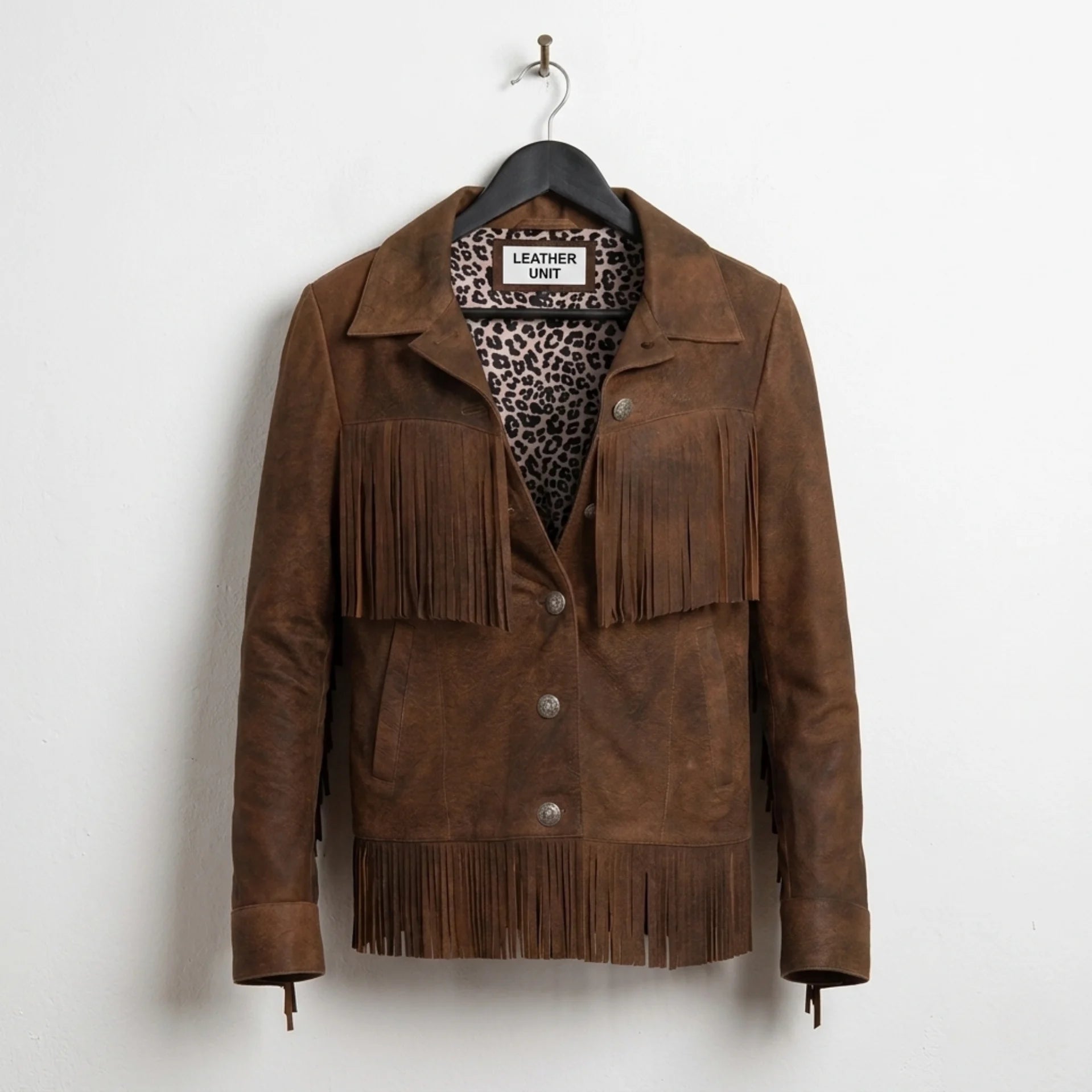 Front view of women’s brown fringe leather jacket with leopard lining by Leather Unit