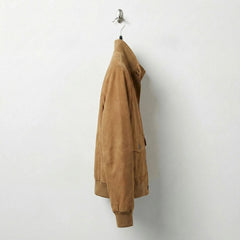 Side profile of women’s camel suede leather bomber jacket