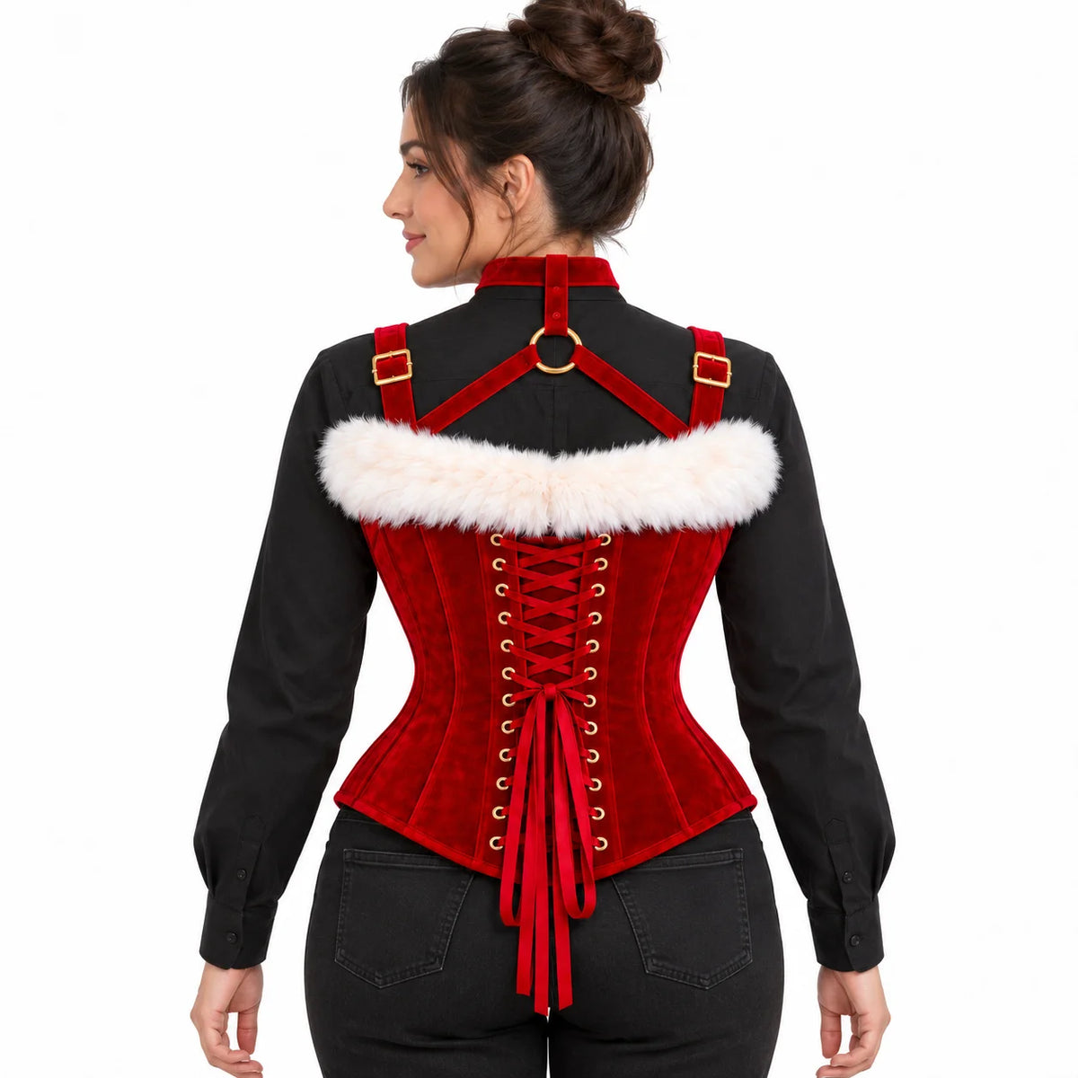 Rear studio view of red velvet Christmas corset highlighting criss-cross back lacing, neckline trim and shoulder harness straps.