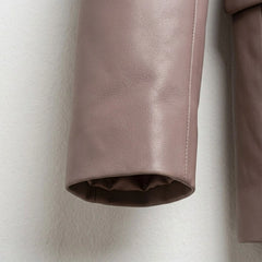 Close up of sleeve and leather texture on women’s taupe blaze