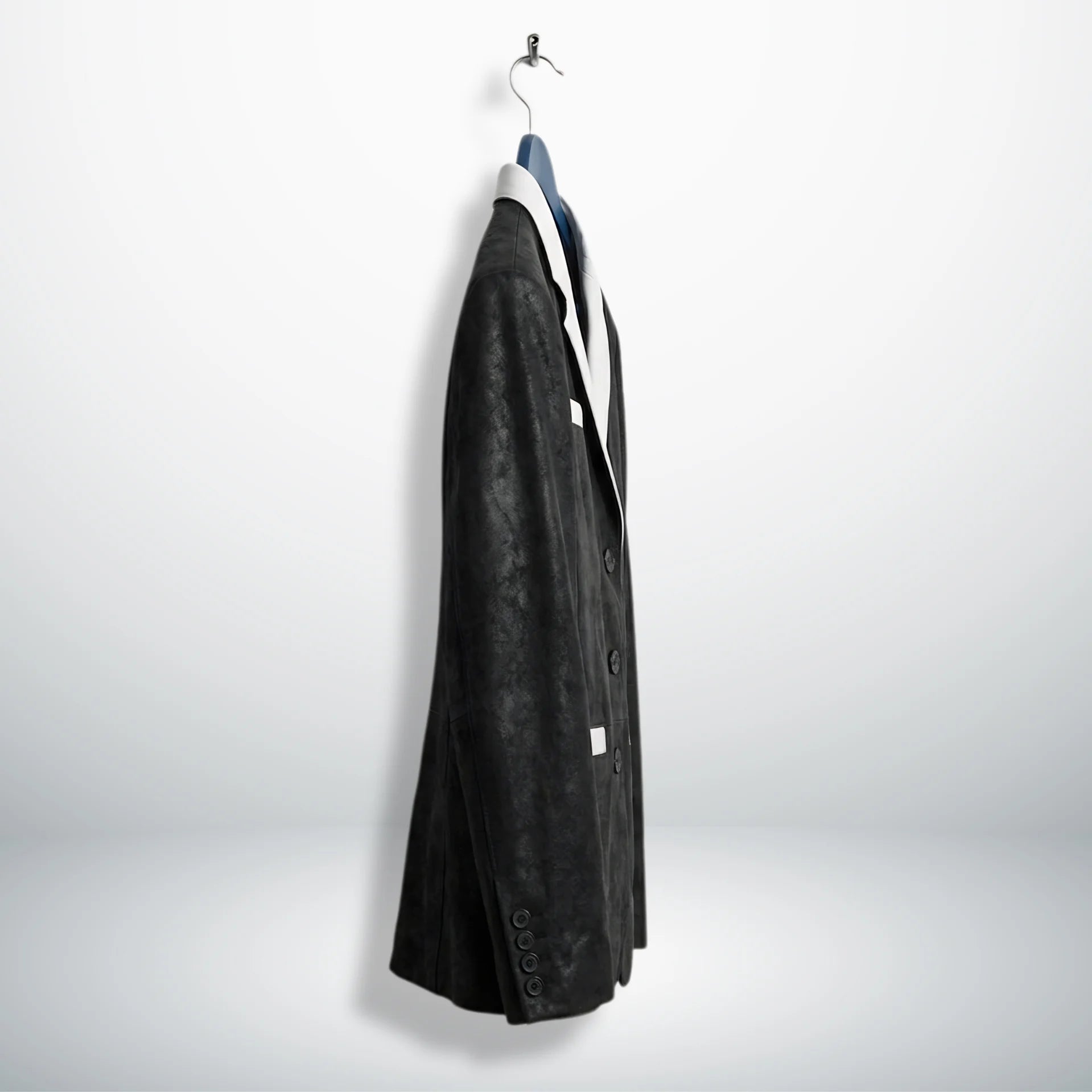 Side profile of men’s black leather blazer with white lapel