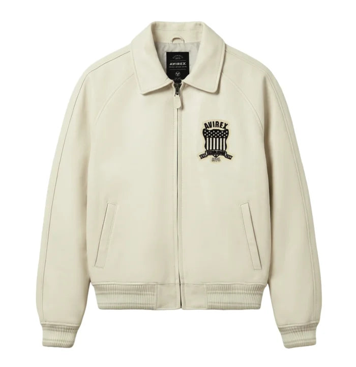 Avirex men’s beige Icon leather bomber jacket front view with shield chest patch, zip closure and rib-knit trims