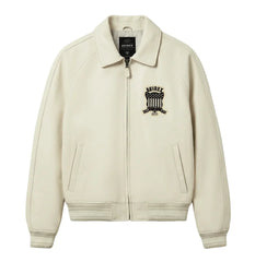 Avirex men’s beige Icon leather bomber jacket front view with shield chest patch, zip closure and rib-knit trims