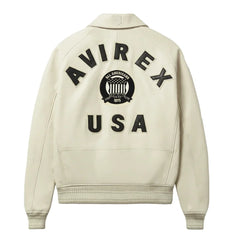 Back view of Avirex beige leather bomber with black AVIREX lettering, All Americans crest and USA appliqué