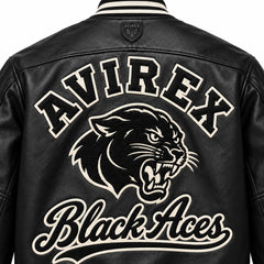 Close-up back view of Avirex Black Aces leather jacket showing oversized AVIREX lettering, panther graphic and cream script